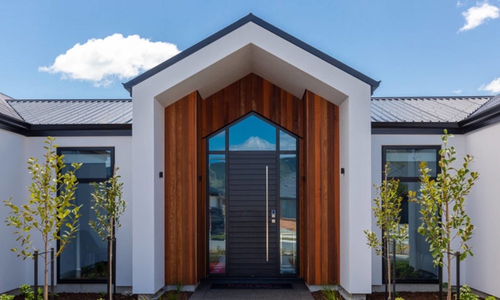 Entrance door with side and top glass panels